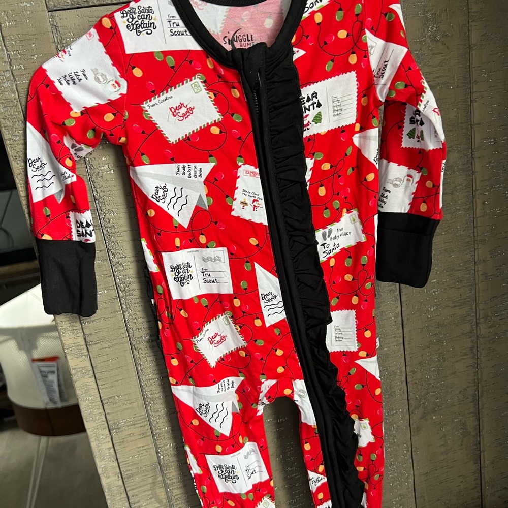NWT. santa wishes bamboo ruffle butt zippy 3/6 months.